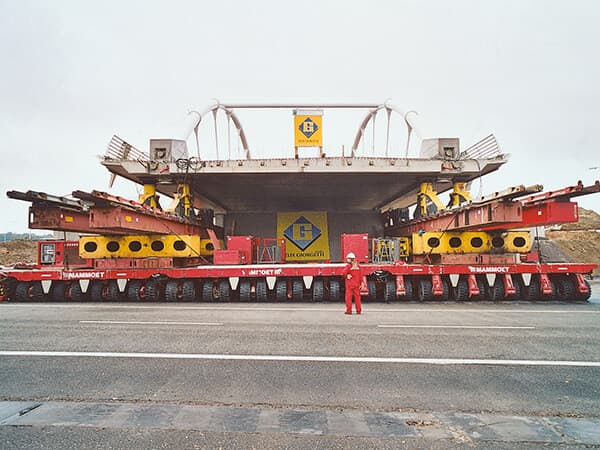 Bow-string bridge in Gasperich. A highly technical site where the pre-built bridge had to be transported via motorway.